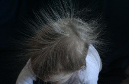 Trying to use a piece of fleece as a backdrop, all we really got was big static hair.