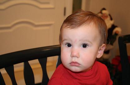 At the Astle's for Christmas Eve.  I just like her expression in this one.