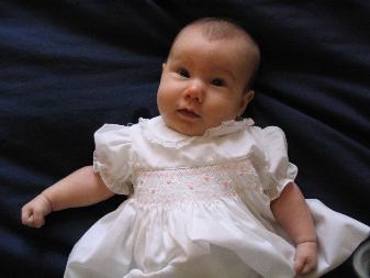 Finally, a couple of Audrey on our bed.  I liked the lighting, and her dress just made her look really pretty.