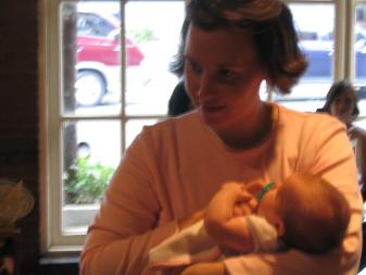Laura holding Audrey at Chili's.  As a candid, this one is blurry if you make it bigger.
